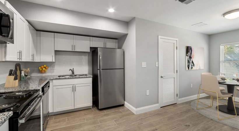 Spacious modern kitchen with stainless appliances  - Royal Isles Apartments in Orlando
