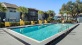 Outdoor pool - Royal Isles Apartments