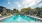 pool with lounge chairs - Royal Isles Apartments in Orlando